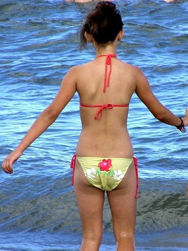 Free porn pics of Hot latina teens at beach & pools 15 of 24 pics