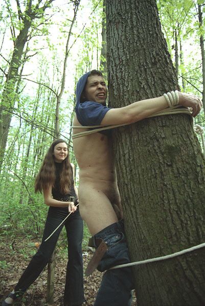 Free porn pics of Mistress switching her slave in the woods 19 of 34 pics