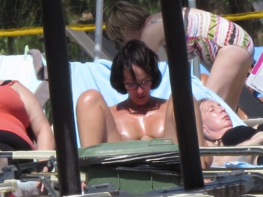 Free porn pics of Brunette caught topless in Agia Marina, Creta! 10 of 35 pics