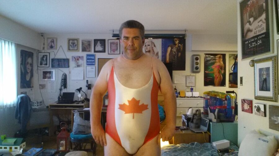 Free porn pics of My new canada flag one-piece swimsuit 2 of 3 pics