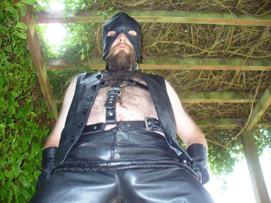 Free porn pics of Leather master in hood with whip 24 of 25 pics