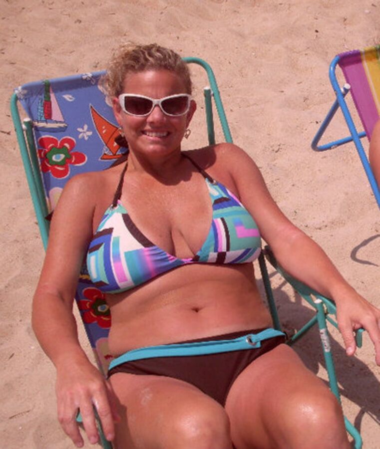 Free porn pics of nc milf at beach  1 of 4 pics