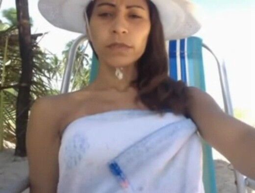 Free porn pics of Latina fisting her ass at beach live on cam! 1 of 8 pics