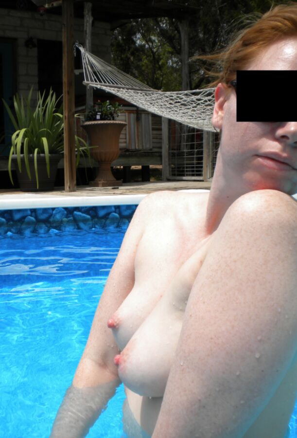 Free porn pics of Redhead wife skinny dipping, swimming naked!  9 of 27 pics