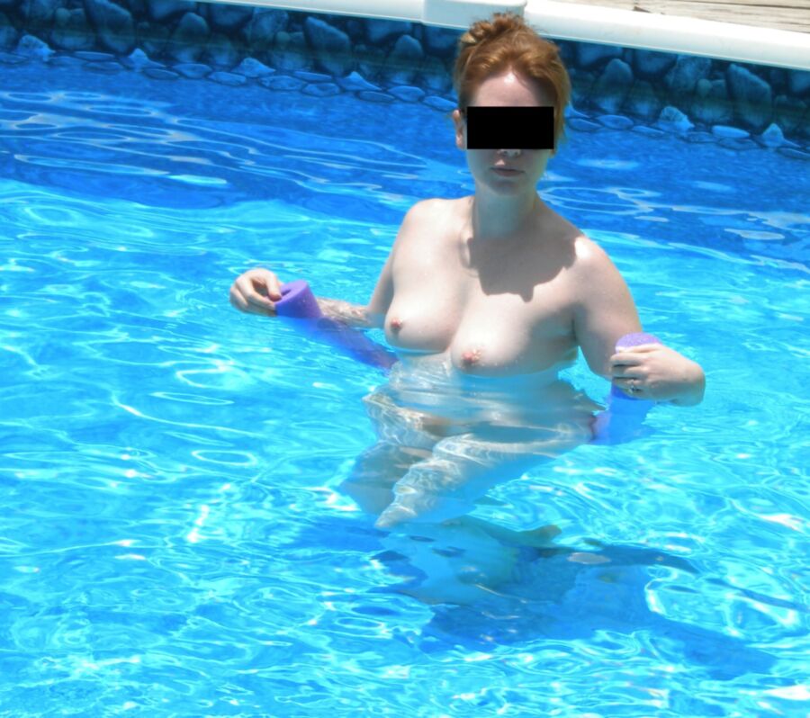 Free porn pics of Redhead wife skinny dipping, swimming naked!  13 of 27 pics
