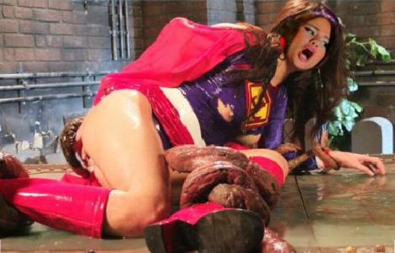 Free porn pics of Selena Gomez as superheroine supergirl in tentacle trouble 1 of 2 pics