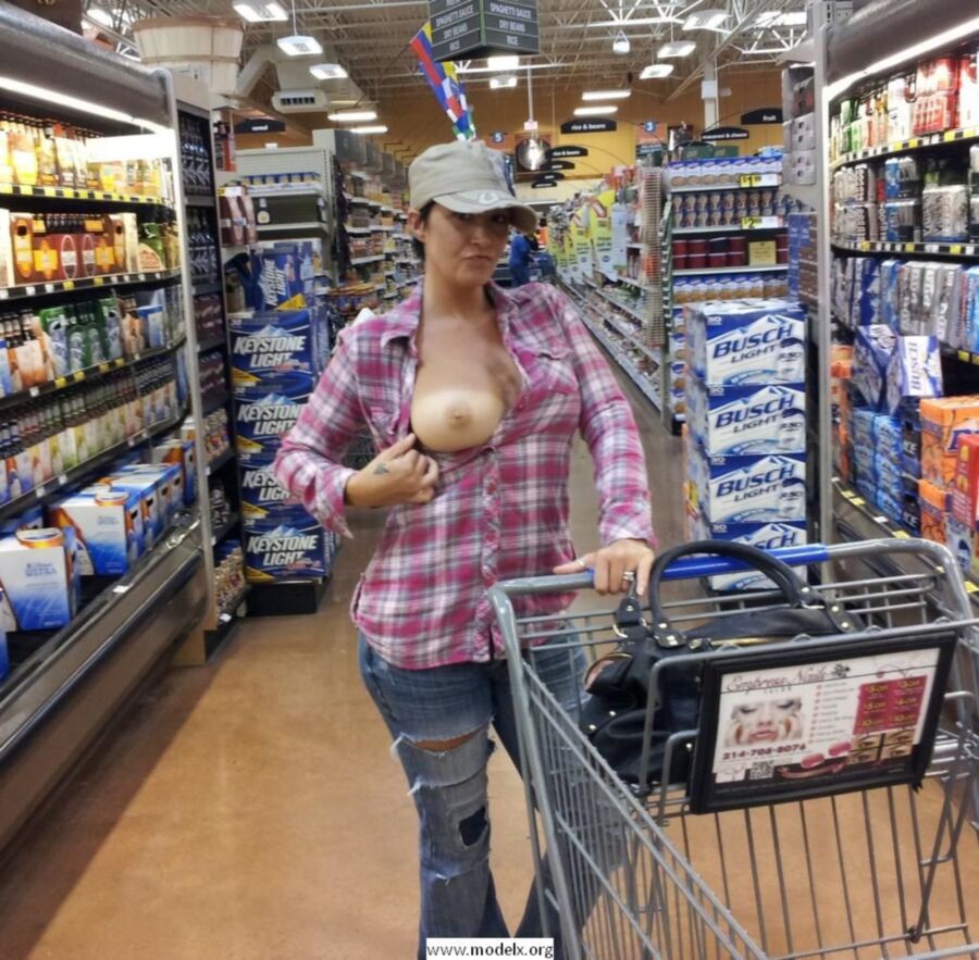 Free porn pics of Pics of Amateur Girls Flashing in public stores 20 of 28 pics