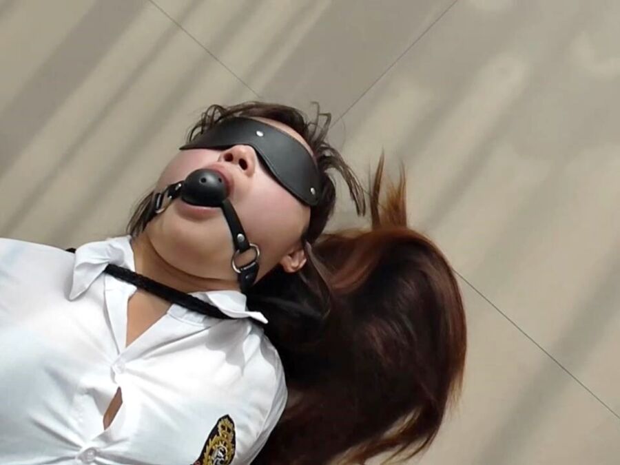 Free porn pics of Chinese schoolgirl gagged, blindfolded and hogtied 17 of 92 pics