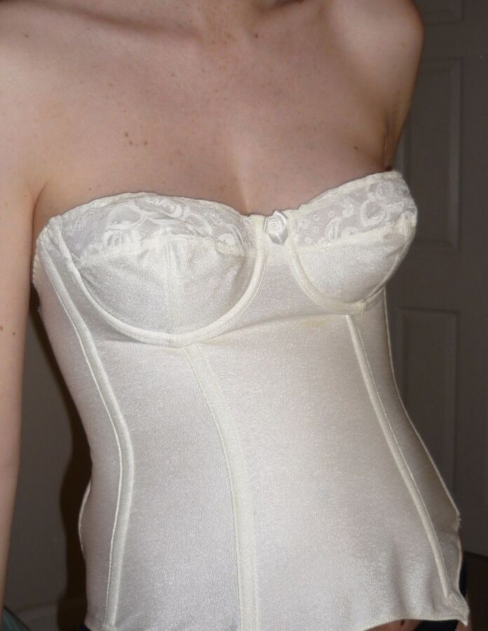 Free porn pics of Bitch in a white corset 2 of 2 pics