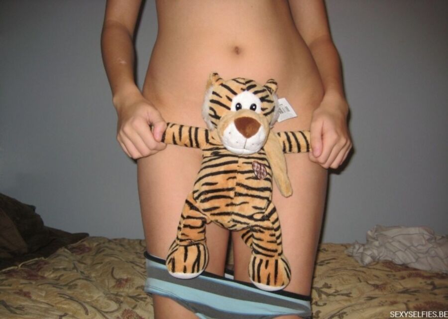 Free porn pics of Sexy brunette with her tiger 2 of 43 pics