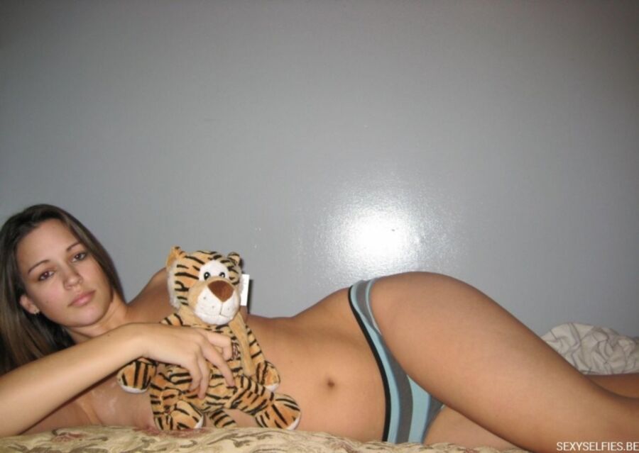 Free porn pics of Sexy brunette with her tiger 12 of 43 pics