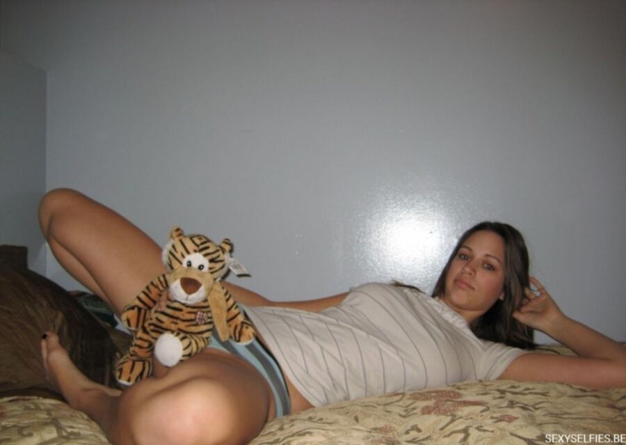 Free porn pics of Sexy brunette with her tiger 5 of 43 pics