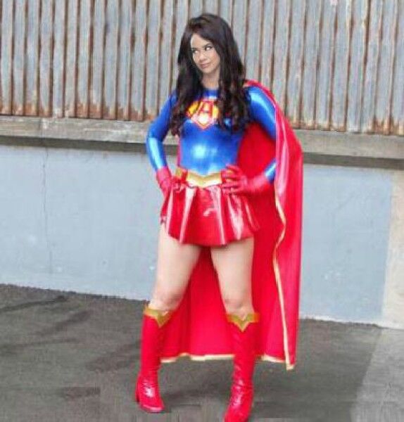 Free porn pics of aj lee as superheroine supergirl femdom 1 of 3 pics