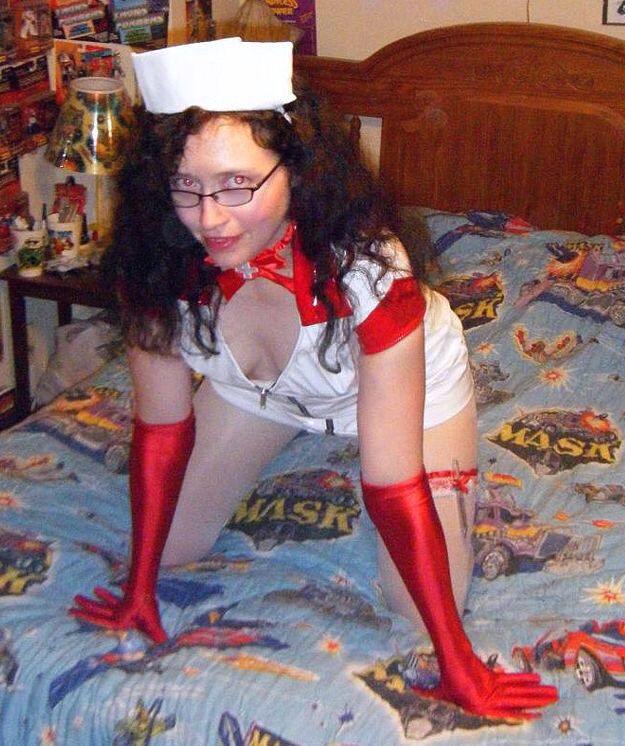 Free porn pics of PVC Nurse wants to service your Hard Cock 3 of 5 pics