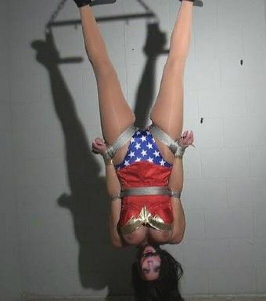 Free porn pics of Liv Tyler As Wonder Woman bondage femdom 7 of 10 pics