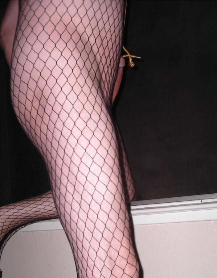 Free porn pics of more of my fishnet window fun 4 of 7 pics