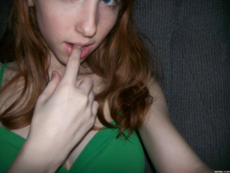 Free porn pics of This redhead teen knows to drive men crazy... 9 of 143 pics