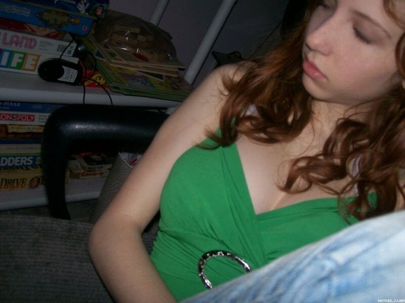 Free porn pics of This redhead teen knows to drive men crazy... 20 of 143 pics