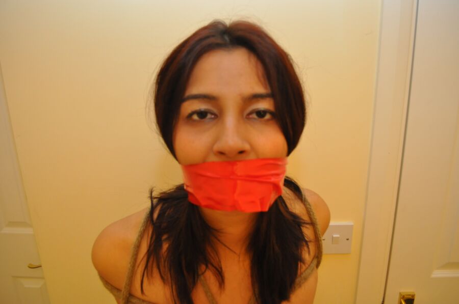 Free porn pics of Asha cleave, ball, tape, and bitgagged  9 of 10 pics
