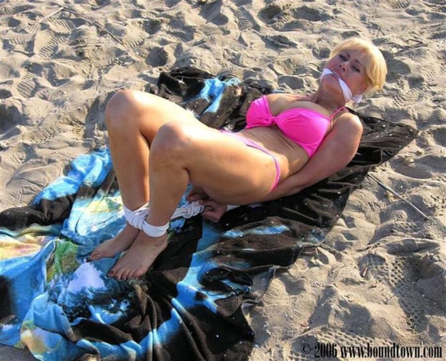Free porn pics of Bikini blonde tied on the beach 19 of 35 pics