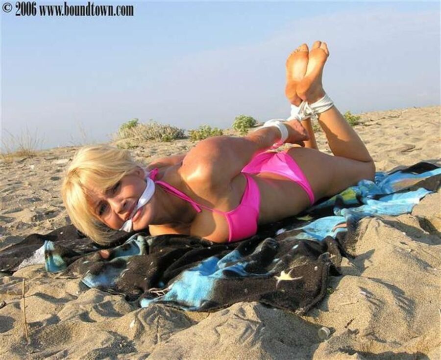 Free porn pics of Bikini blonde tied on the beach 13 of 35 pics