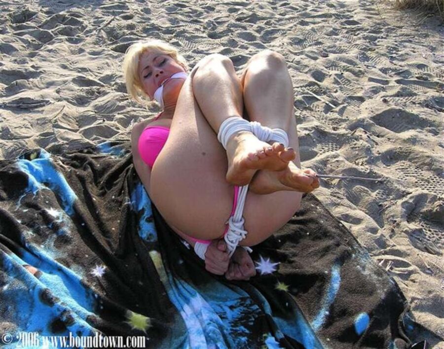 Free porn pics of Bikini blonde tied on the beach 20 of 35 pics