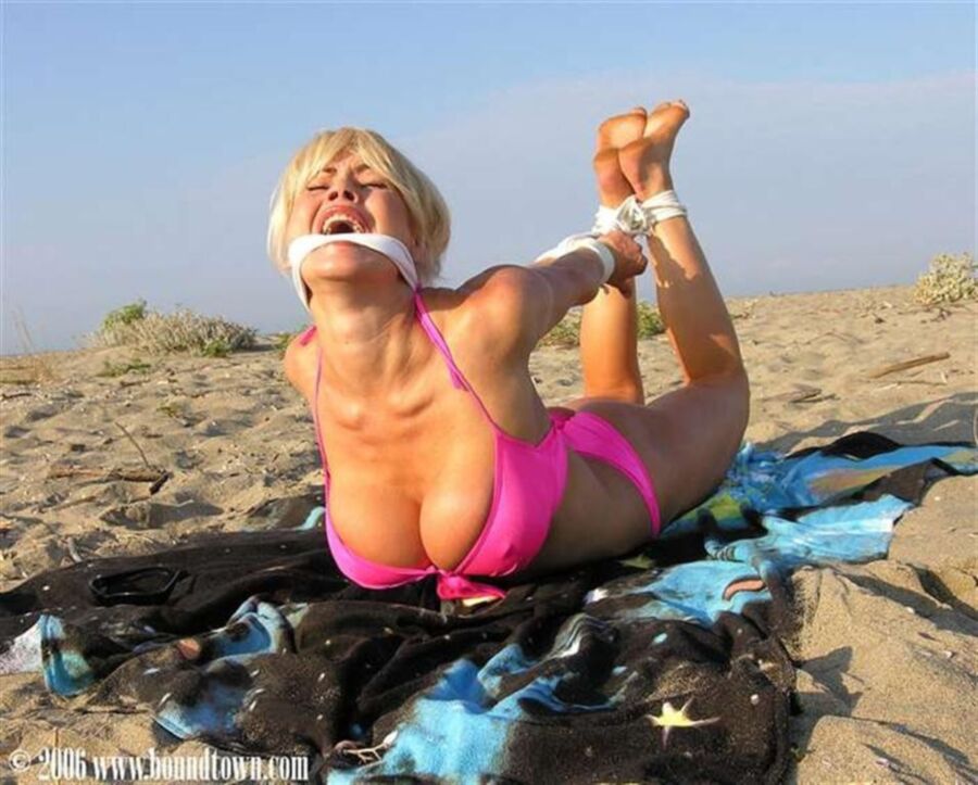 Free porn pics of Bikini blonde tied on the beach 14 of 35 pics