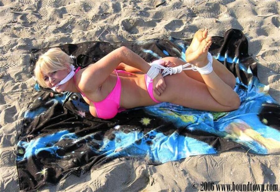 Free porn pics of Bikini blonde tied on the beach 15 of 35 pics