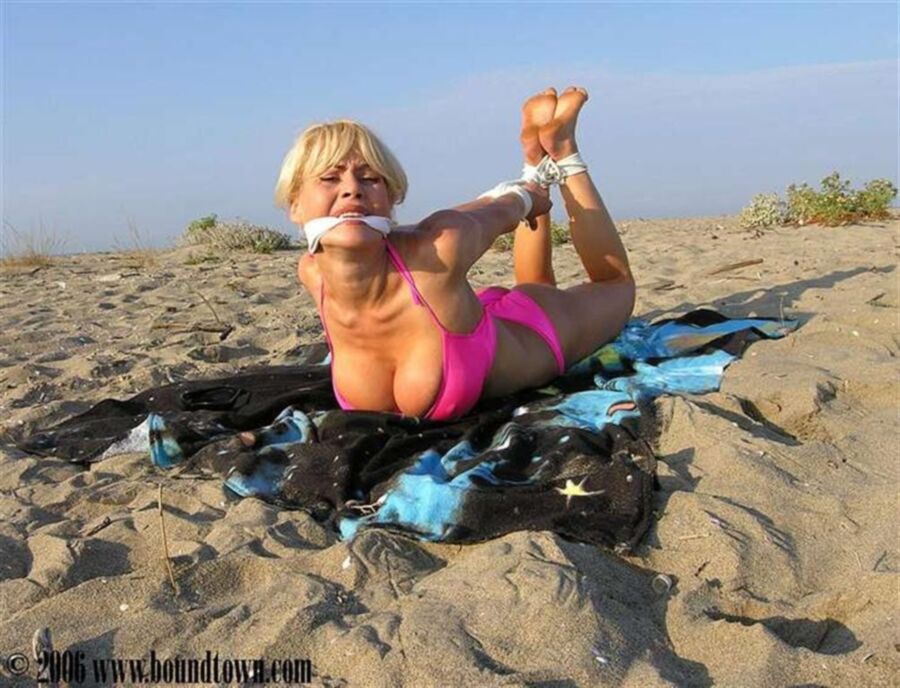 Free porn pics of Bikini blonde tied on the beach 12 of 35 pics
