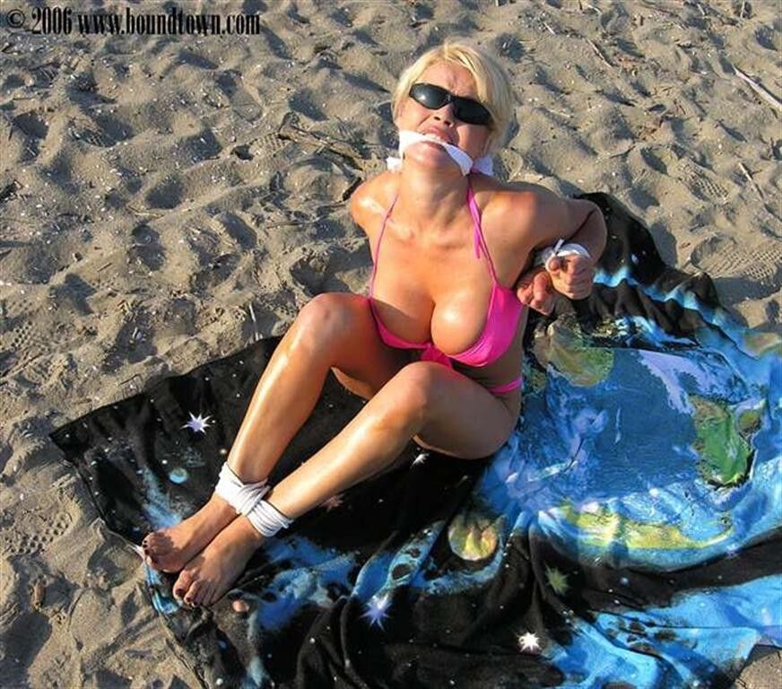 Free porn pics of Bikini blonde tied on the beach 4 of 35 pics
