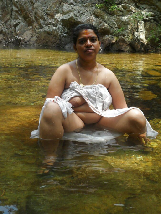 Free porn pics of TAMIL AUNTY BATHING IN RIVER 10 of 12 pics