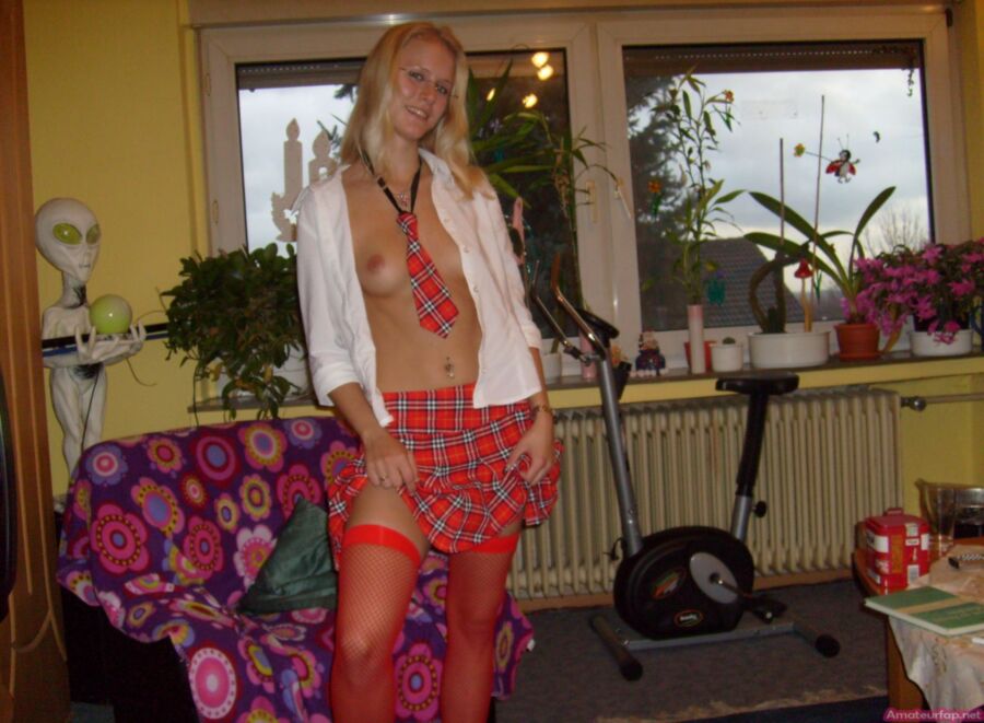 Free porn pics of Blonde College Girl In A Tight Skirt & Red Stockings 2 of 30 pics