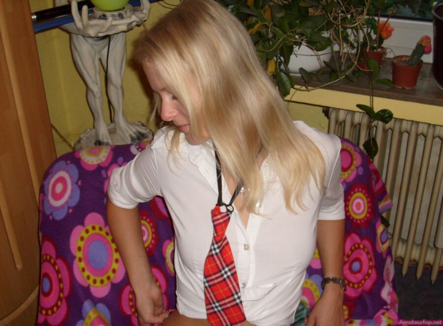 Free porn pics of Blonde College Girl In A Tight Skirt & Red Stockings 12 of 30 pics