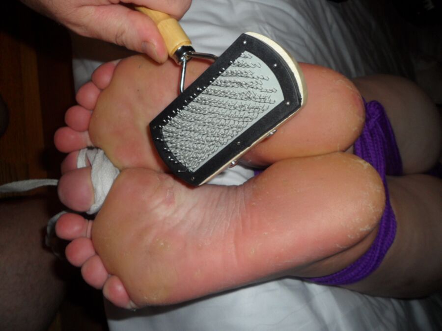 Free porn pics of wifes foot torture on bed 11 of 21 pics