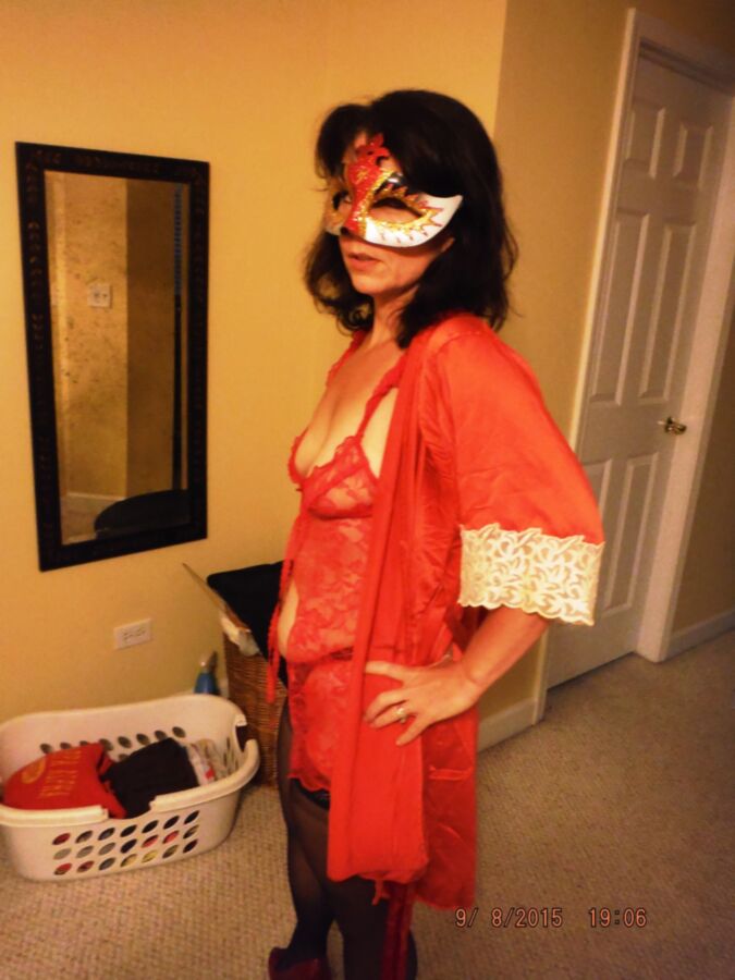 Free porn pics of masked wife 1 of 9 pics
