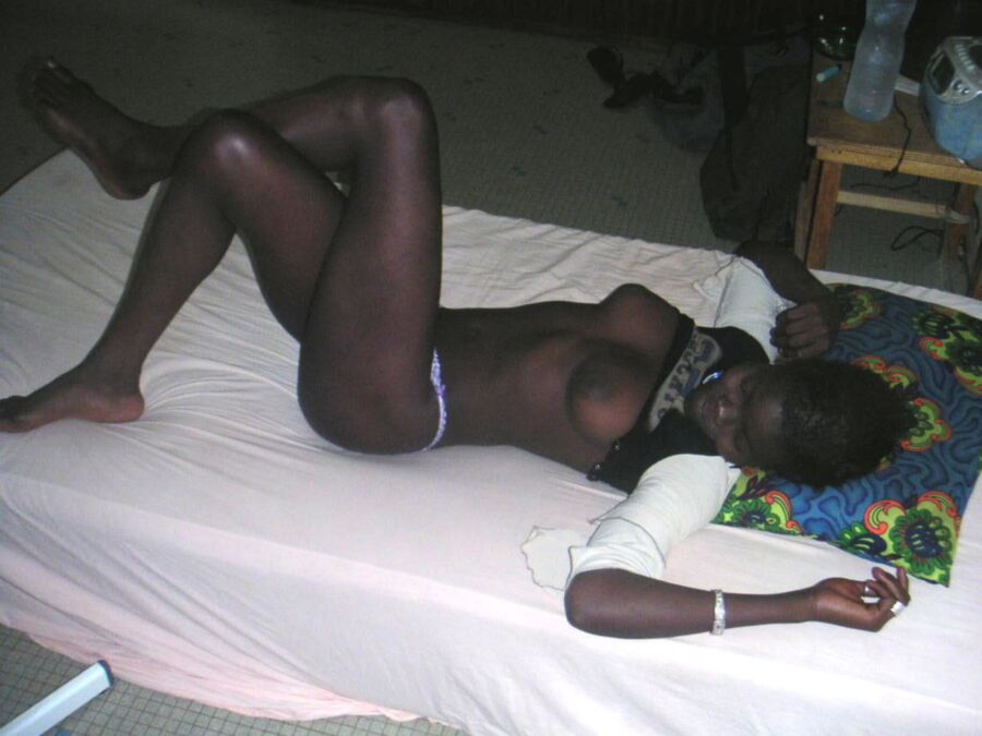 Free porn pics of Burkina Faso - happy teenage hooker Aicha 1 of 7 pics