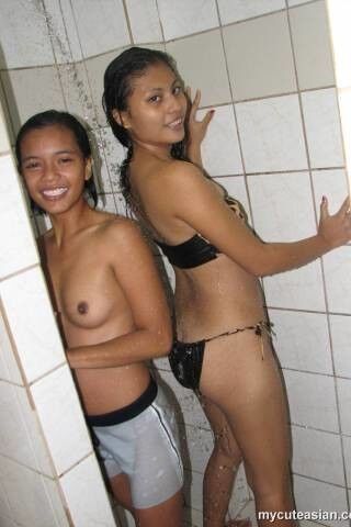Free porn pics of Lesbian Thai girl bathing 9 of 55 pics
