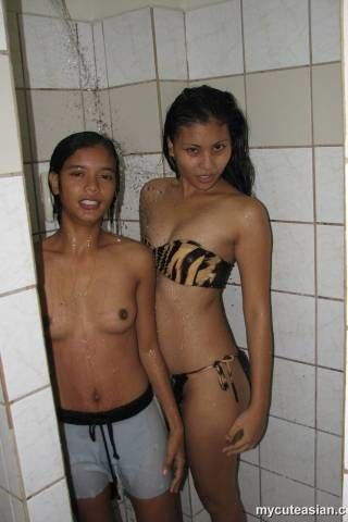 Free porn pics of Lesbian Thai girl bathing 14 of 55 pics