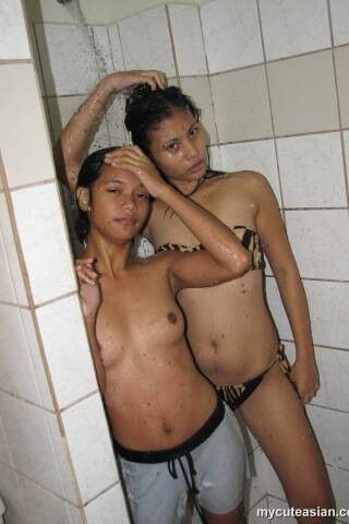 Free porn pics of Lesbian Thai girl bathing 11 of 55 pics