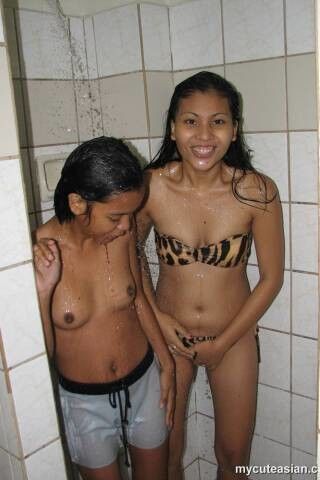 Free porn pics of Lesbian Thai girl bathing 13 of 55 pics