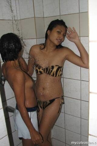 Free porn pics of Lesbian Thai girl bathing 4 of 55 pics