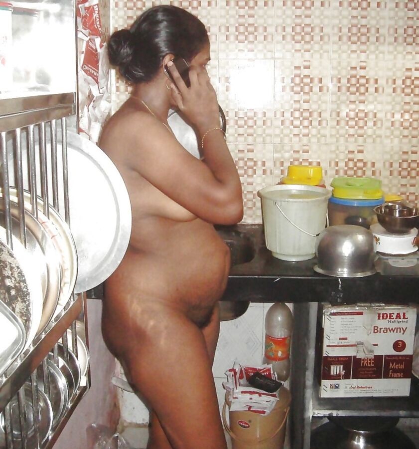 Free porn pics of DESI TAMIL MATURE AUNTY NUDE IN KITCHEN 5 of 23 pics