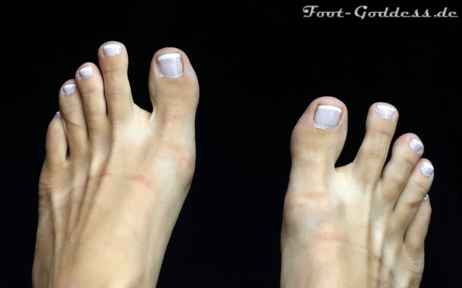 Free porn pics of Foot-Goddess Gosia Feet barefoot in car toes with french nails 8 of 15 pics