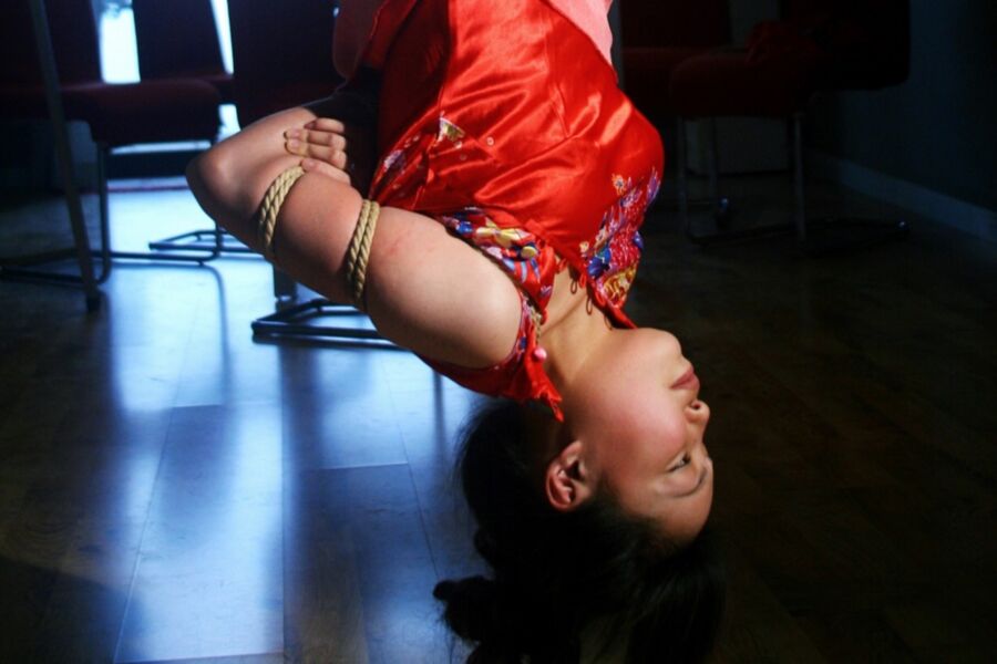 Free porn pics of A sexy Chinese girl suspended upside down 20 of 24 pics