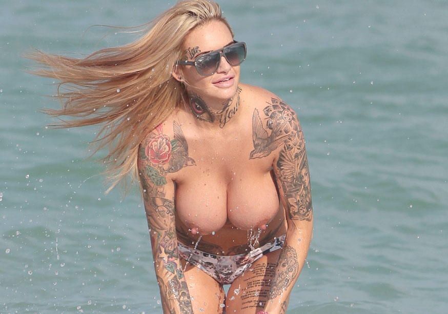 Free porn pics of Dirty blonde celebrity Jemma Lucy bare tits beach 13 of 18 pics