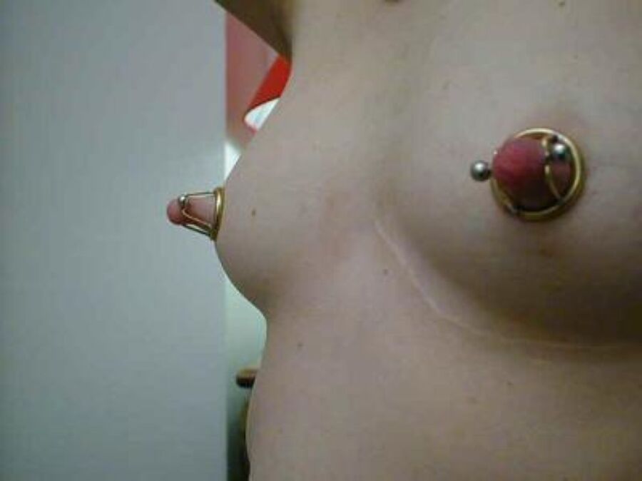 Sweet nipple pierced smoking webcam girl free porn photos
