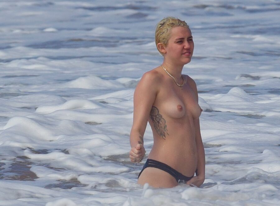 Free porn pics of Miley Cyrus 4 of 76 pics