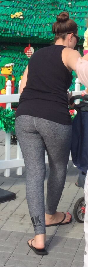 Free porn pics of sexy young mom wearing yoga pants in amusement park 3 of 9 pics
