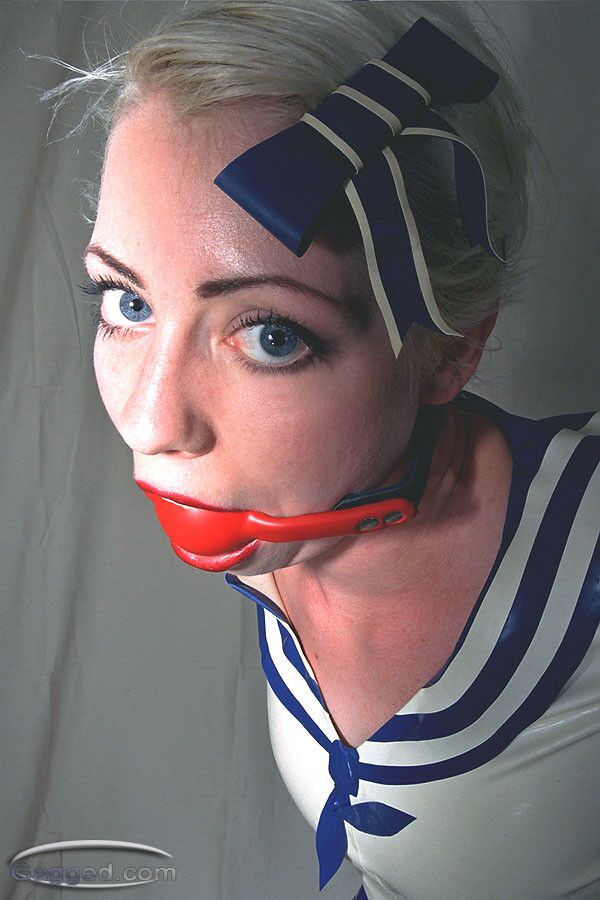 Free porn pics of Blonde Bound And Gagged In Latex 18 of 35 pics
