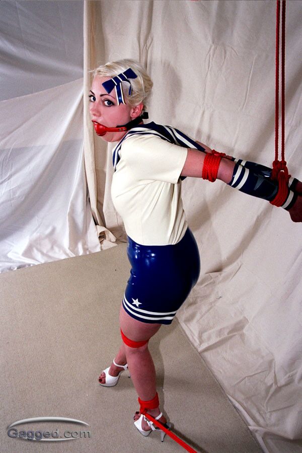 Free porn pics of Blonde Bound And Gagged In Latex 22 of 35 pics